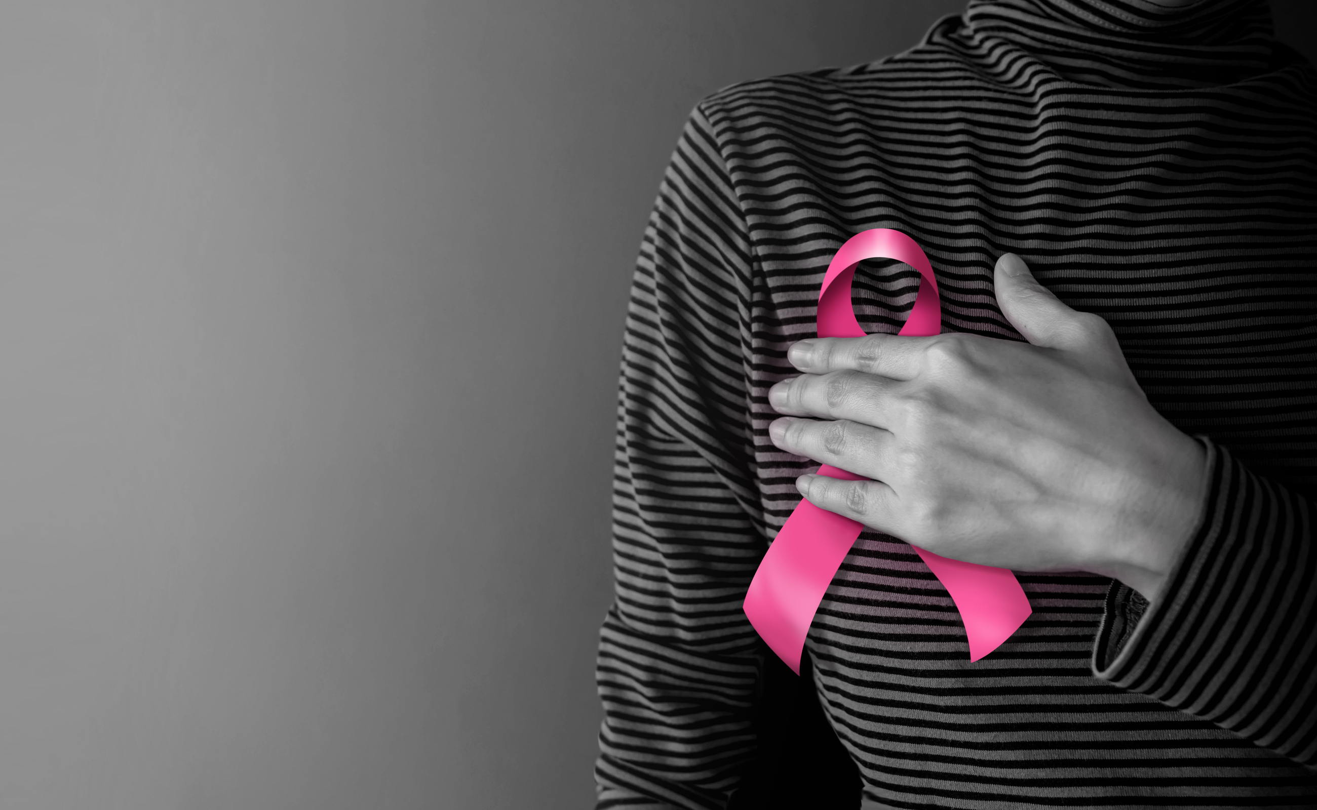 Woman with a Pink Ribbon on Shirt